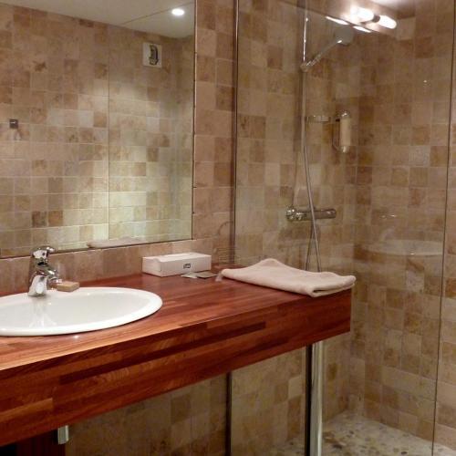 Foto del baño de Hôtel de l&amp;#039;Amphithéâtre
