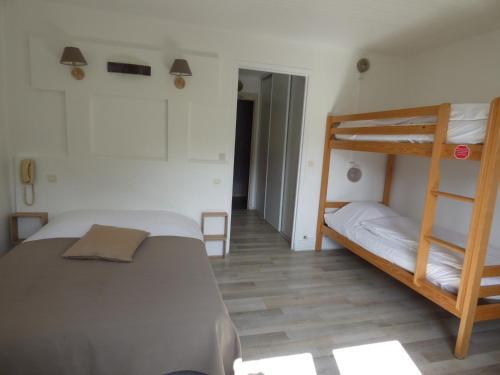 Foto de una habitación de Hotel Logis La Cremaillere