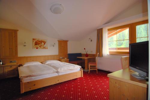 Foto de una habitación de Hotel Garni Forelle