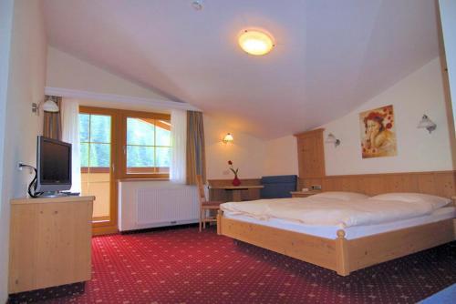 Foto de una habitación de Hotel Garni Forelle