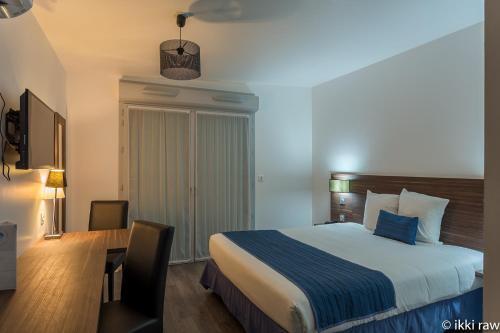 Foto de una habitación de Hotel Libera Caen Colombelles