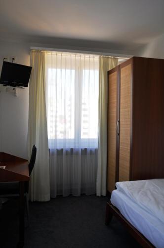 Foto de una habitación de Hotel Landhus