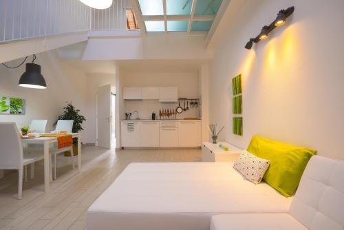 Foto de una habitación de Apartamentos Via Breda 120