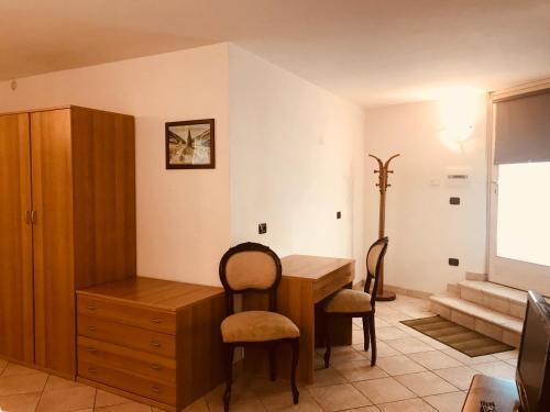 Foto de una habitación de Aparthotel Residence La Corte