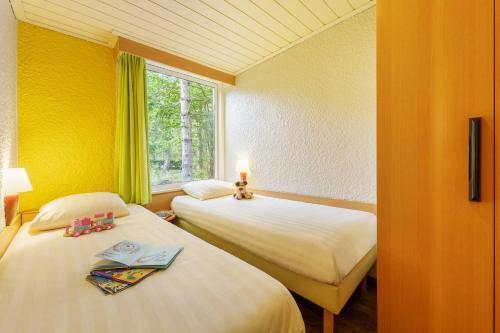 Foto de una habitación de Camping Center Parcs Les Bois-Francs