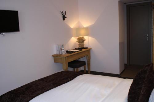 Foto de una habitación de Hotel de la Gare