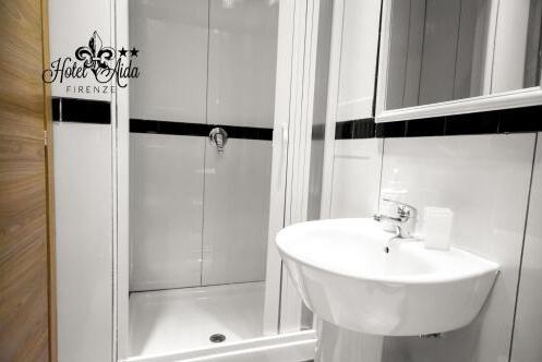 Foto del baño de Hotel Aida