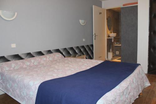 Foto de una habitación de Hotel Les Portes d&amp;#039;Or