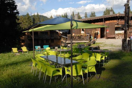 Foto de restauración de Hôtel Chalet Le Caribou