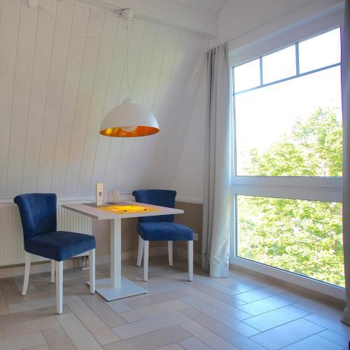 Foto de una habitación de ApartHotel Victoria am See