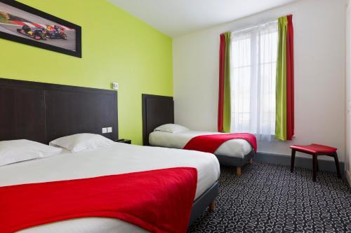 Foto de una habitación de Enzo Hôtel Contrexeville