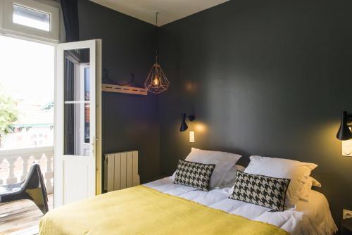 Foto de una habitación de Hotel Home Arcachon