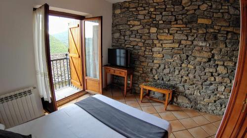 Foto de una habitación de Hotel Rural LAbadia de Sieste