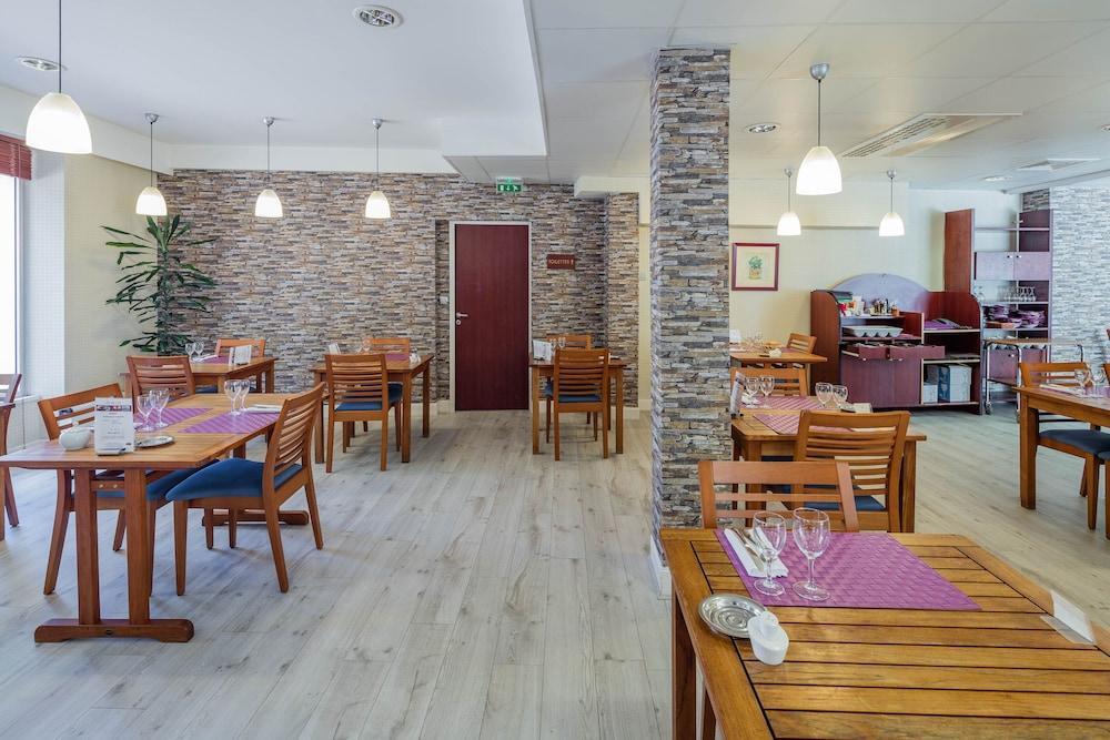 Foto de restauración de Hotel Noemys Néris Montluçon - ex Mona Lisa