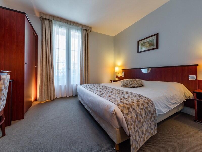 Foto de una habitación de Hotel Noemys Néris Montluçon - ex Mona Lisa