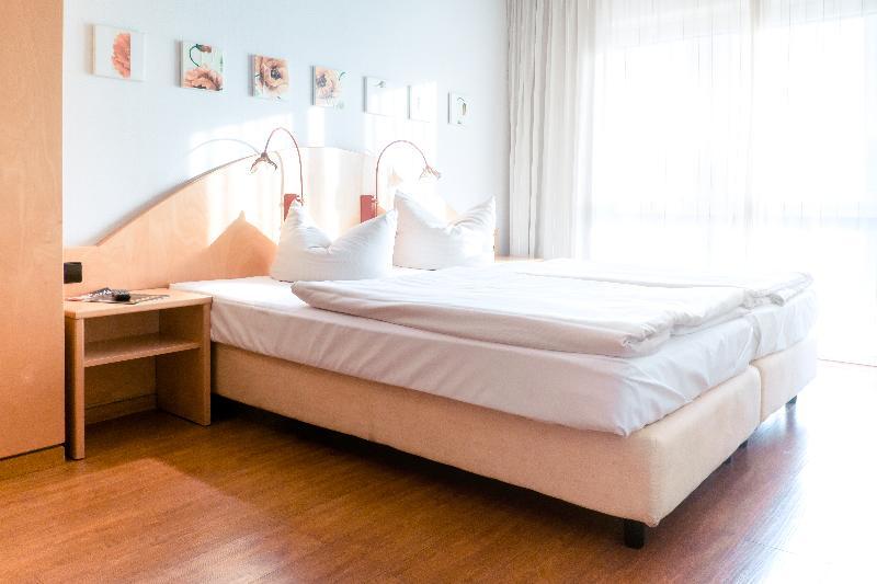 Foto de una habitación de Hotel Ambiente Langenhagen Hannover by Tulip Inn