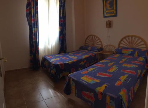 Foto de una habitación de Apartamentos Punta del Moral