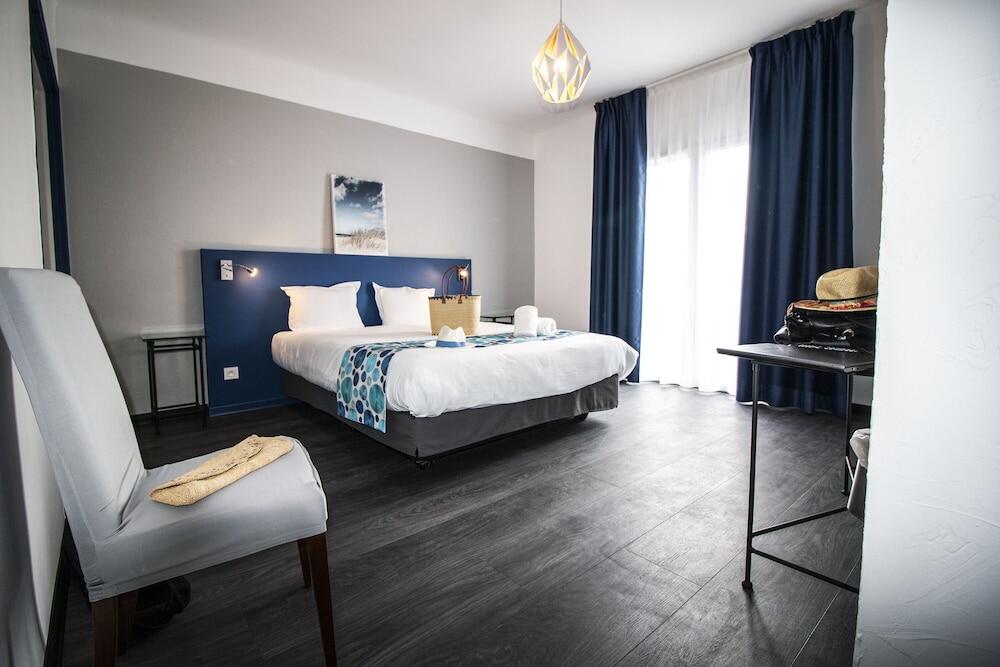 Foto de una habitación de Hôtel Bel Azur