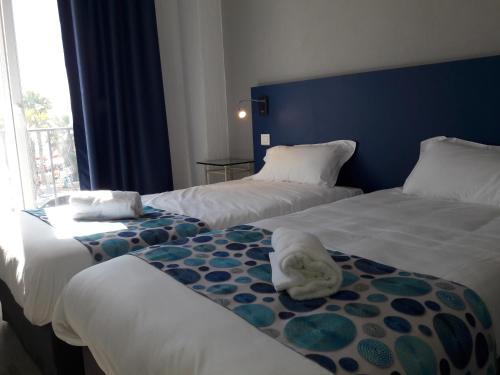 Foto de una habitación de Hôtel Bel Azur