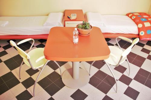 Foto de una habitación de Ostello La Miniera