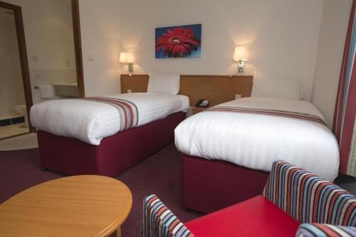 Foto de una habitación de Hotel Ramada by Wyndham Cambridge
