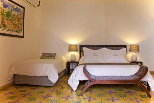 Foto de una habitación de Hotel Villa Colonial