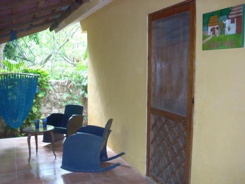 Foto de una habitación de Hotel Macan Ché B&amp;amp;B