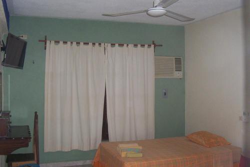 Foto de una habitación de Posada El Jardin