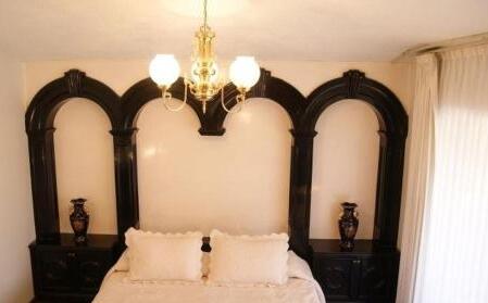 Foto de una habitación de Quintaesencia Hotel Boutique