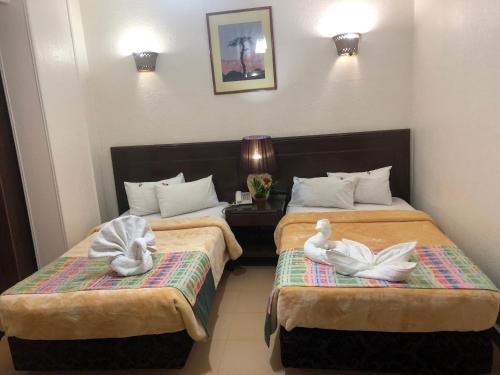 Foto de una habitación de Bonne Vie Hotel
