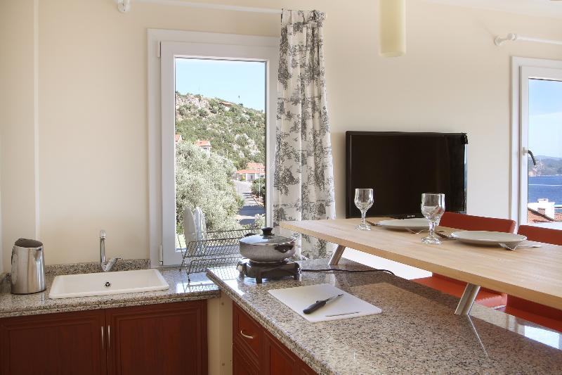 Foto de una habitación de Hotel Saylam Suites