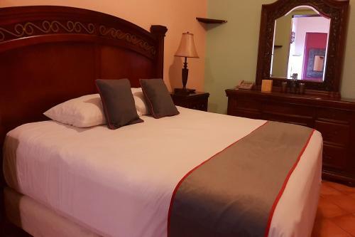 Foto de una habitación de Alebrije Hotel Boutique