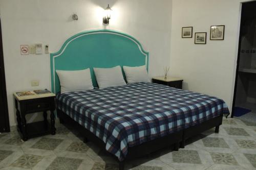 Foto de una habitación de Posada Ya´ax Ich