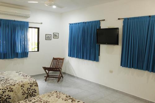 Foto de una habitación de Posada Ya´ax Ich