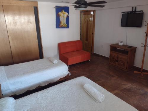 Foto de una habitación de Hotel Leyenda del Tepozteco
