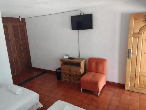 Foto de una habitación de Hotel Leyenda del Tepozteco