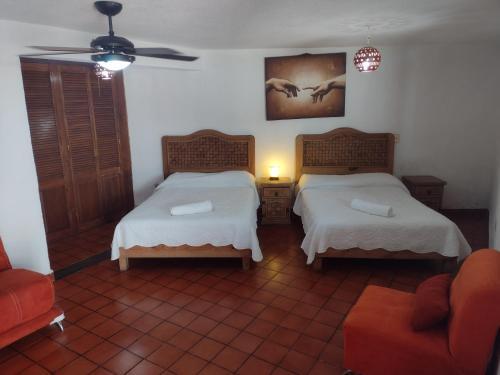 Foto de una habitación de Hotel Leyenda del Tepozteco