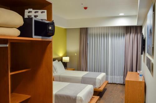 Foto de una habitación de Concept Hotel