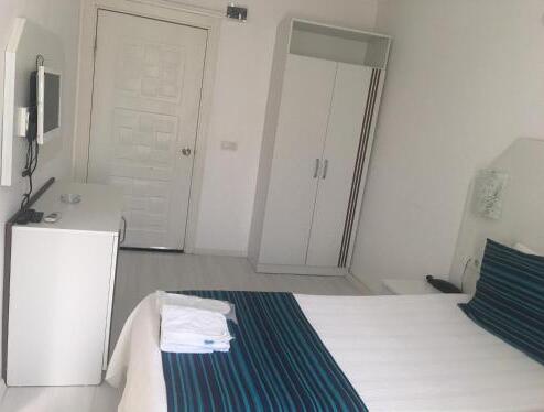Foto de una habitación de Teos Hotel