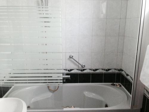 Foto del baño de Hotel Consul