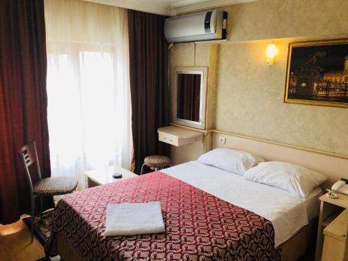 Foto de una habitación de Hamit Hotel