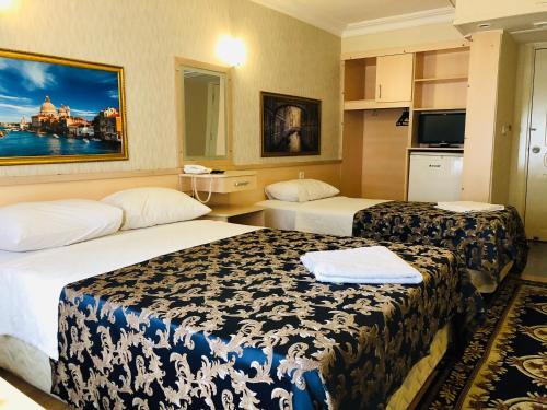 Foto de una habitación de Hamit Hotel