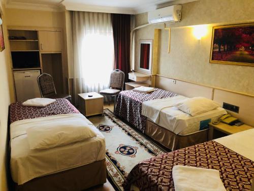 Foto de una habitación de Hamit Hotel