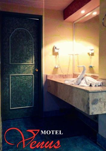 Foto del baño de Auto Hotel Venus