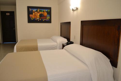 Foto de una habitación de Hotel Mesón de la Chinantla