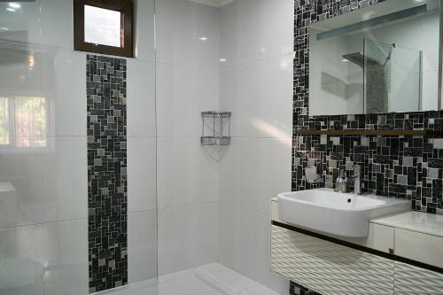 Foto del baño de Aida Hotel