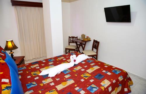 Foto de una habitación de Hotel Los Jardines
