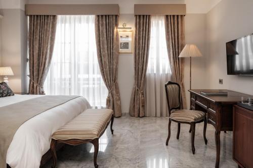 Foto de una habitación de Hotel Palais Le Brun