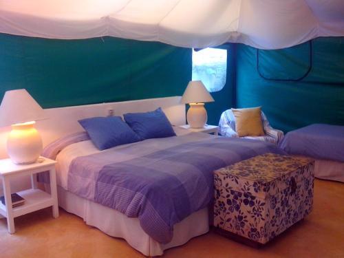Foto de una habitación de Junto al Rio Bungalows &amp;amp; Suites