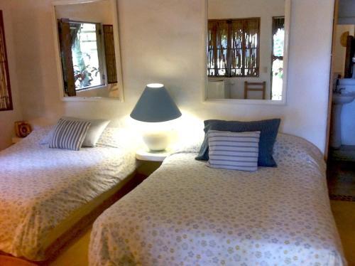 Foto de una habitación de Junto al Rio Bungalows &amp;amp; Suites